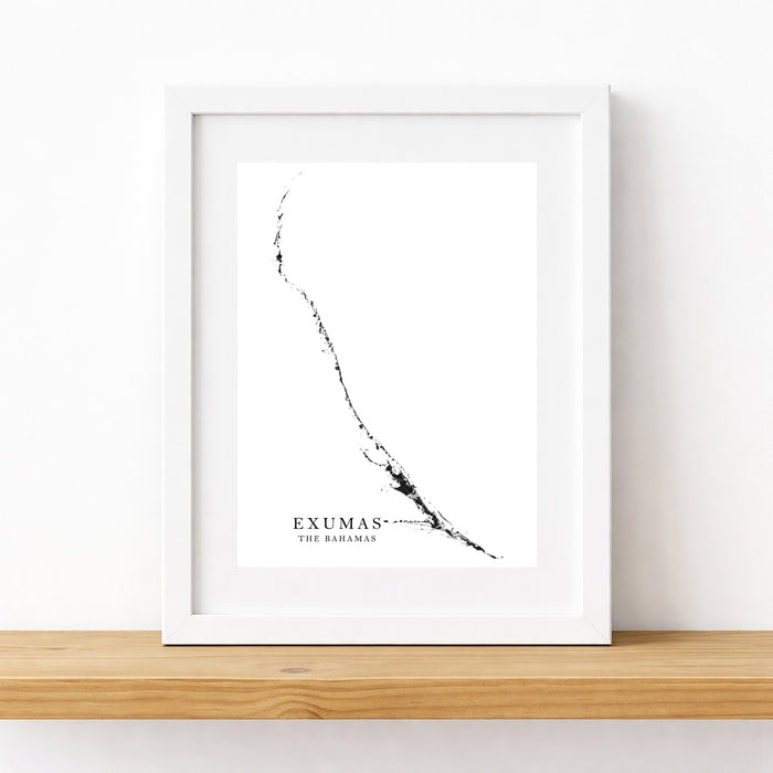 Framed map print of Exumas, The Bahamas on a white wall.