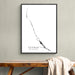 Framed map of Exumas, The Bahamas on a wall above a wooden bench.