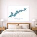 Map of Fishers Island on a wall above a bed in a bedroom.