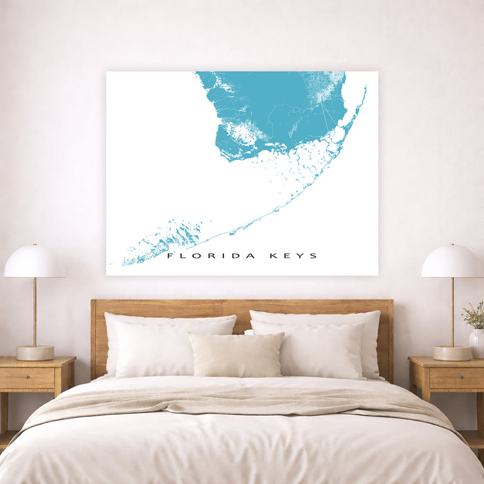 Bedroom with a map of the Florida Keys on the wall above a bed.