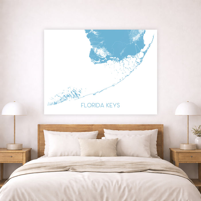 Bedroom with a map of the Florida Keys on the wall above a bed.