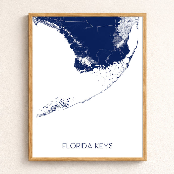Framed map of the Florida Keys on a beige wall