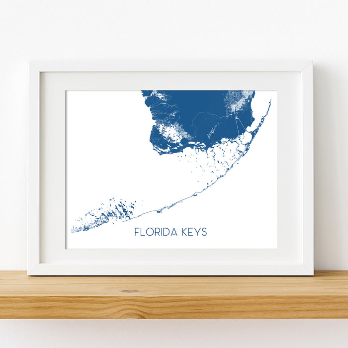 Framed map of the Florida Keys on a white wall
