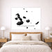 Bedroom with a large wall art piece of the Galápagos Islands.