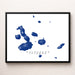 Framed map of the Galapagos Islands on a white wall