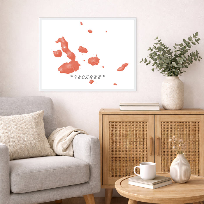 Living room with a gray sofa, wooden cabinet, and a framed map of the Galapagos Islands on the wall.