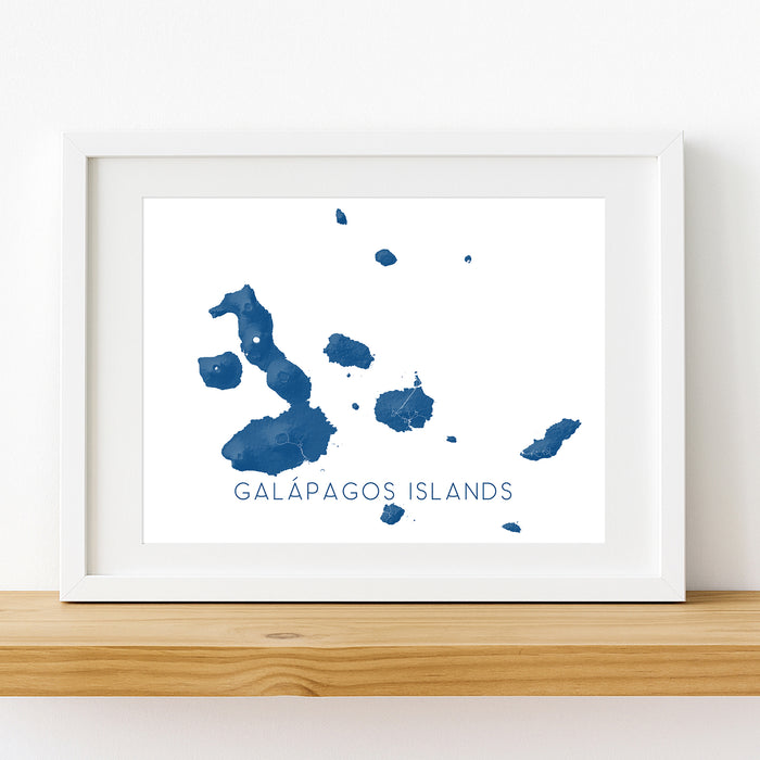 Framed artwork of the Galápagos Islands with blue watercolor design on a white background.