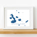 Framed artwork of the Galápagos Islands with blue watercolor design on a white background.
