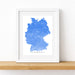 Framed map of Germany with a blue topographic design on a white background
