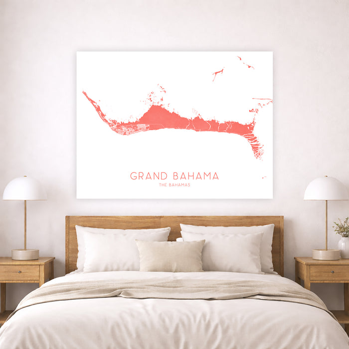 Bedroom with a map of Grand Bahama on the wall above a bed.