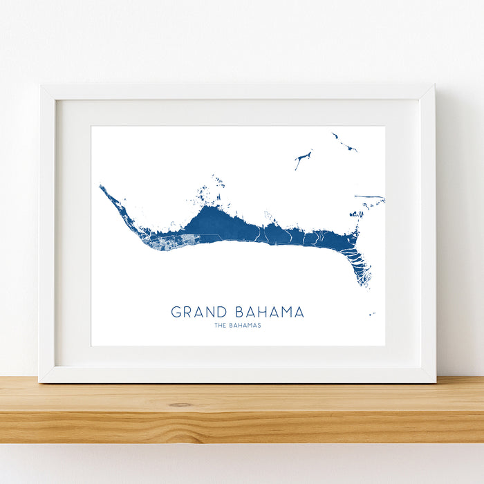 Framed map of Grand Bahama on a white wall
