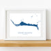 Framed map of Grand Bahama on a white wall