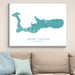 Framed map of Grand Cayman on a wall above a beige sofa with light blue pillows.