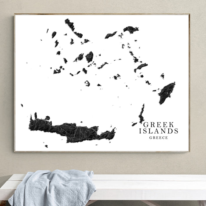 Framed map of Greek Islands on a wall above a white bench.
