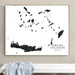 Framed map of Greek Islands on a wall above a white bench.