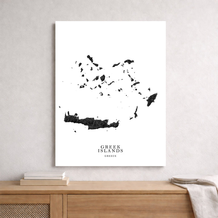 Framed map of Greek Islands on a wall above a wooden shelf.