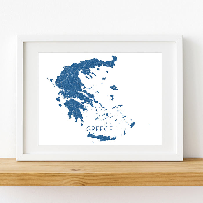 Framed map of Greece on a white wall