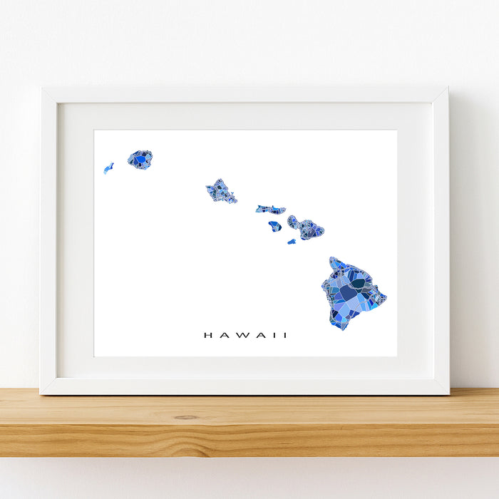 Framed artwork of a blue map of Hawaii on a white background