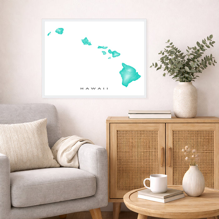Living room with a gray sofa, wooden cabinet, and decorative items including a map of Hawaii.