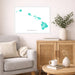 Living room with a gray sofa, wooden cabinet, and decorative items including a map of Hawaii.