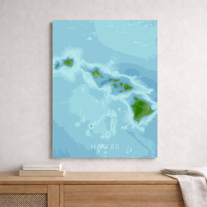 Canvas print of Hawaii with blue and green colors, displayed on a wooden surface.