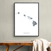 Framed map of Hawaii on a wall above a wooden bench.