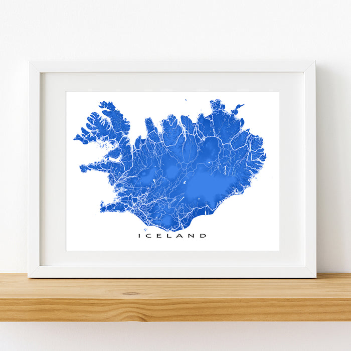 Framed map of Iceland on a white wall