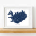 Framed map of Iceland on a white wall