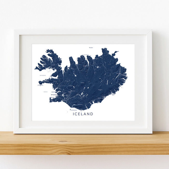 Framed map of Iceland on a white wall
