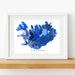 Framed map of Iceland with a watercolor design on a white background