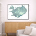 Framed map of Iceland on a wall above a wooden cabinet and sofa.
