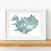 Framed map of Iceland on a white wall