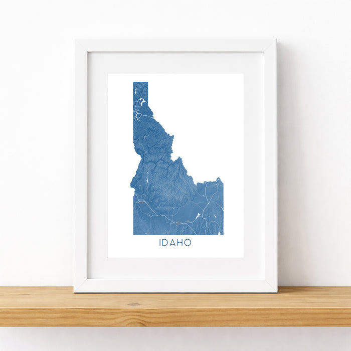 Framed map of Idaho on a white wall