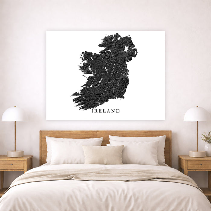 Map of Ireland on a wall above a bed in a bedroom setting