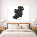Map of Ireland on a wall above a bed in a bedroom setting