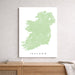 Map of Ireland on a white wall above a wooden shelf.