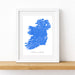 Framed map of Ireland with blue watercolor design on a white background