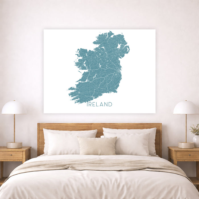 Map of Ireland on a wall above a bed in a bedroom