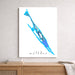 Map of Isla Mujeres in blue on a white background, framed and leaning against a light gray wall.