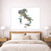 Map of Italy on a wall above a bed in a bedroom