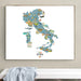 Framed map of Italy on a wall above a white bench.