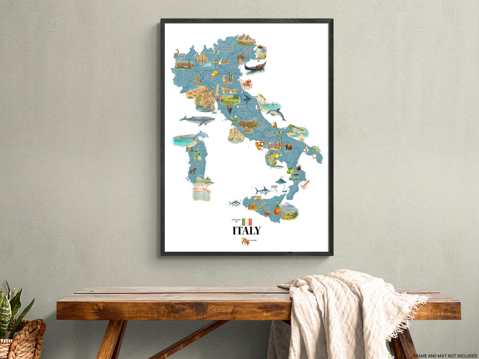 Framed map of Italy on a wall above a wooden table.
