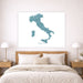 Map of Italy on a wall above a bed in a bedroom