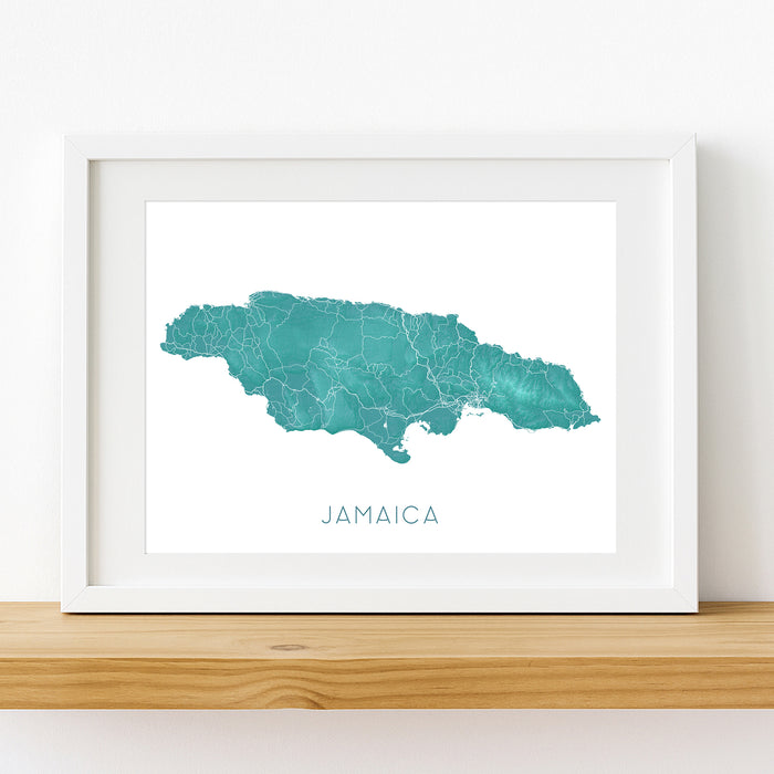Framed map of Jamaica on a white wall