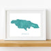 Framed map of Jamaica on a white wall