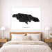Map of Jamaica on a wall above a bed in a bedroom setting