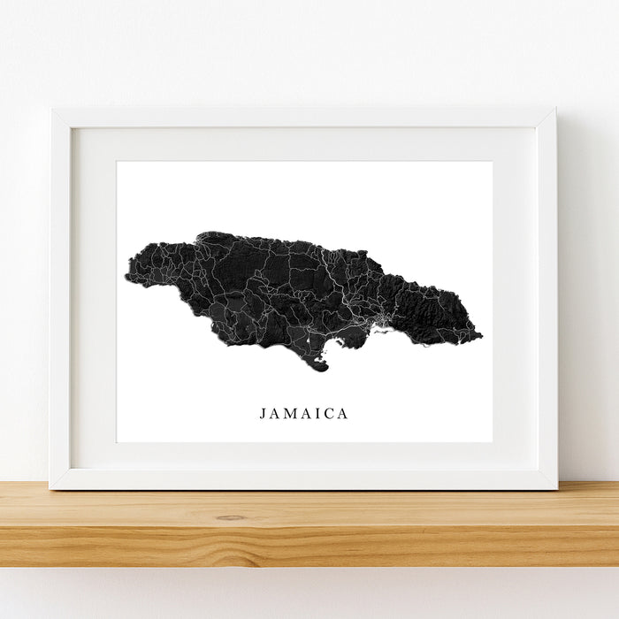 Framed map of Jamaica on a white wall