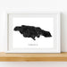 Framed map of Jamaica on a white wall