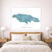 Map of Jamaica on a wall above a bed in a bedroom