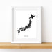 Framed map of Japan on a white wall